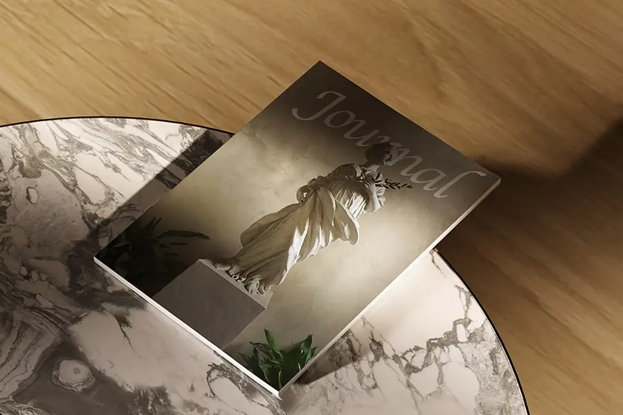 A high school research journal on a coffee table